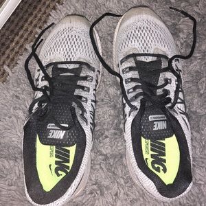 Gray Nike tennis shoes